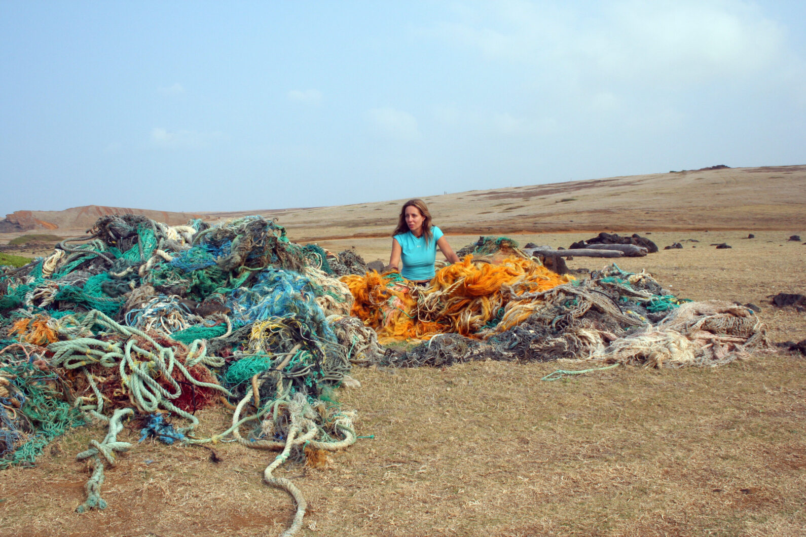 woman in vast, colorful driftnet ball